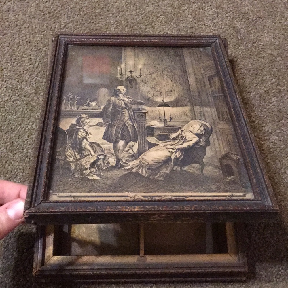 Secret jewelry box hidden in a picture frame